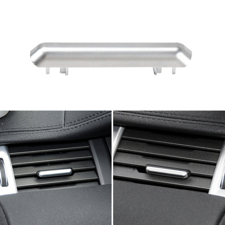 Silver air vent adjustment strip with mounting clips, metallic finish.