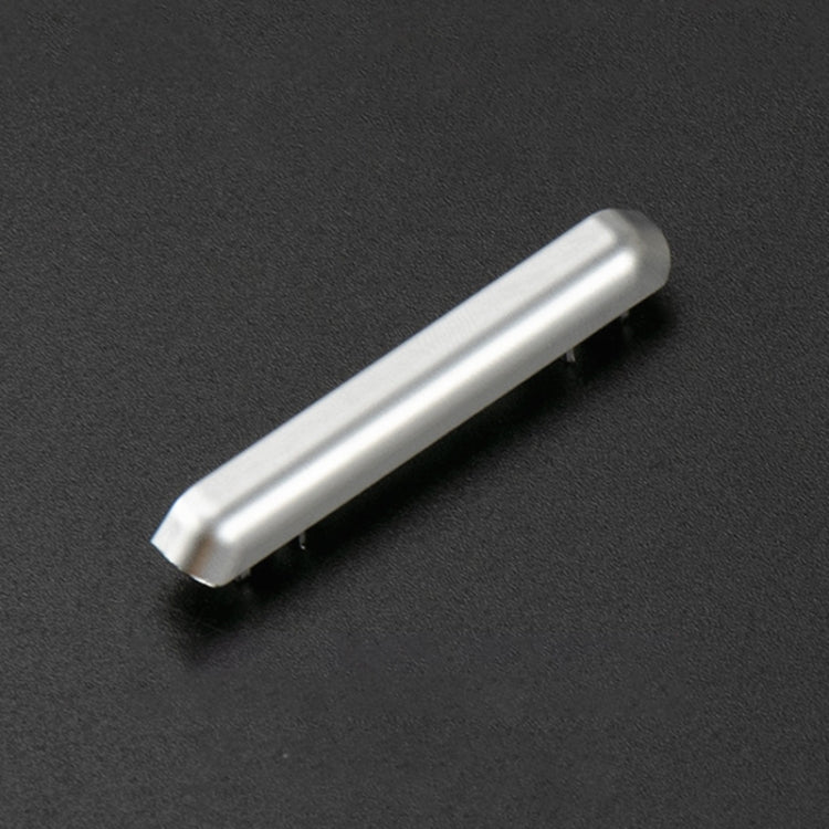 Silver air vent adjustment strip installed on dashboard vent grille slats.