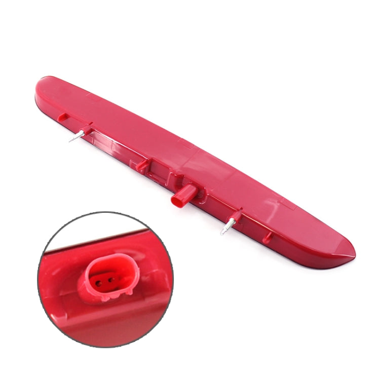 Red high-mount brake light with wiring connector detail inset