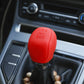 Red silicone shift knob cover installed on car gear lever
