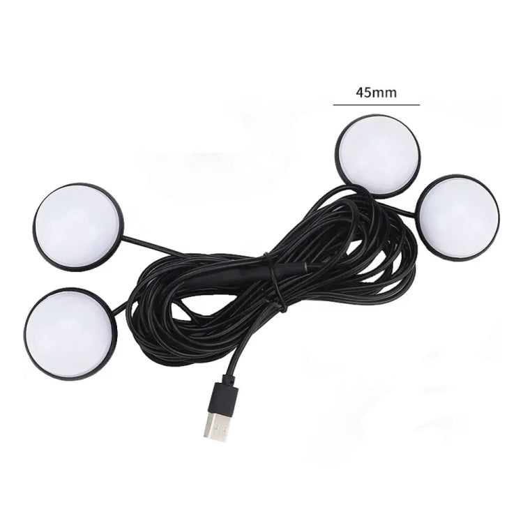 Four round LED foot lights with black cable and USB connector