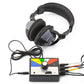Black over-ear stethoscope headset with coiled cable and multi-channel control box