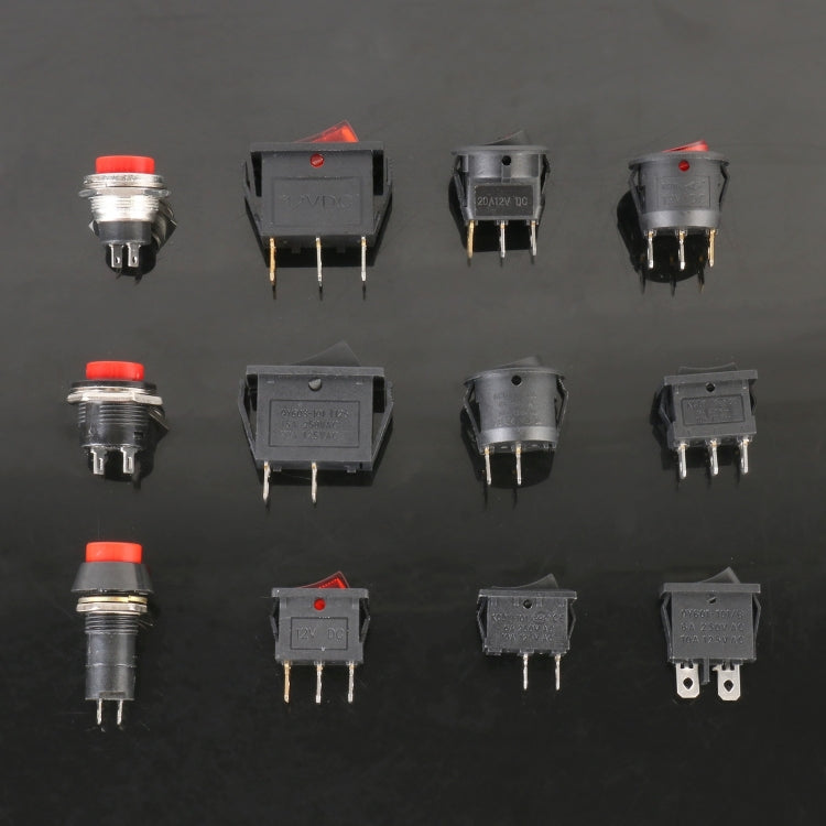 Assorted universal switch modules and push buttons with red-topped indicator caps