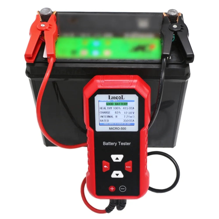 Battery tester connected to a car battery with LCD showing test status