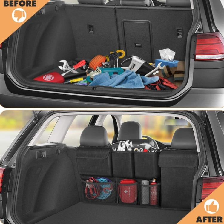 Black car trunk organizer bag with multiple compartments holding bottles and tools