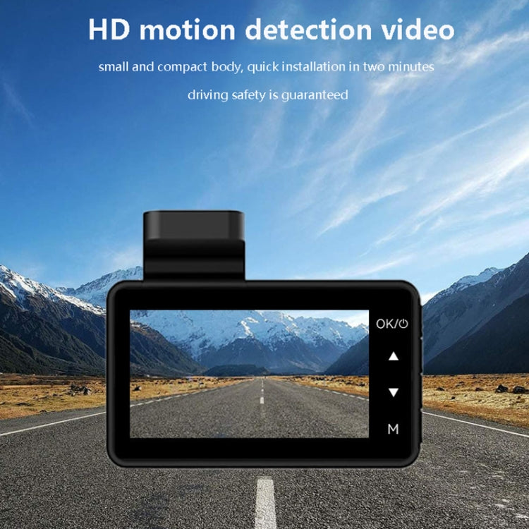 Car dash cam mounted on dashboard showing road view on screen