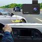 Car dash cam showing highway traffic while mounted inside the car
