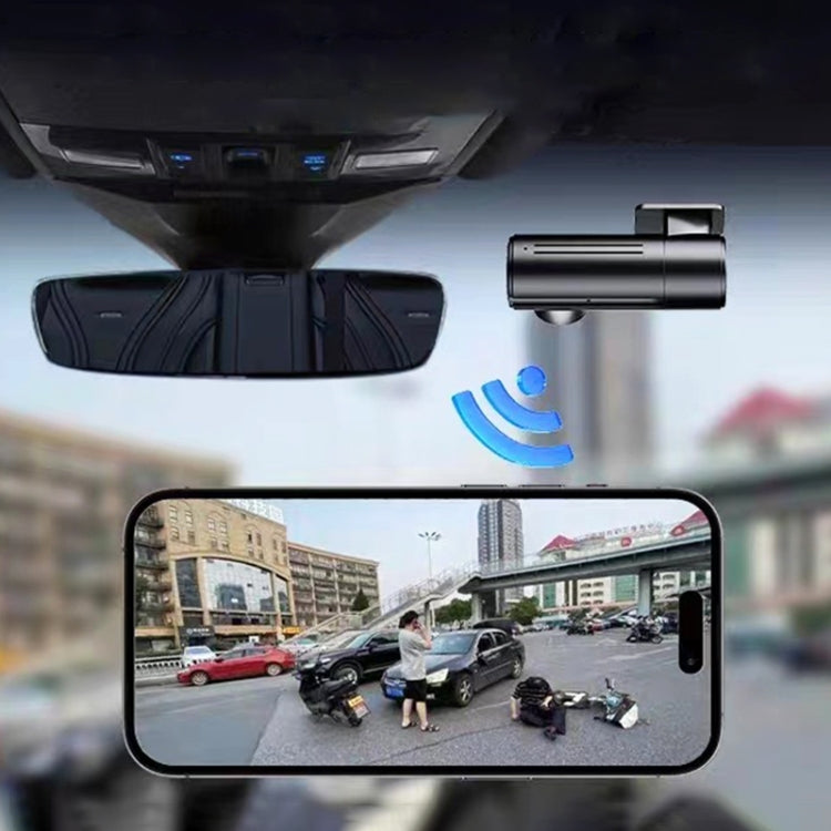 Car dash cam recording on mirror screen with camera unit beside it