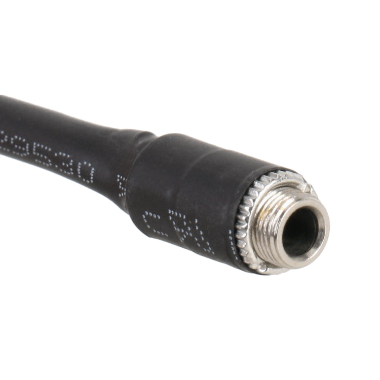 Metal threaded audio jack on black AUX input cable end