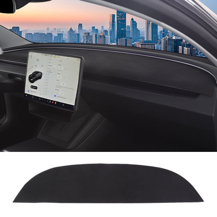 Black dashboard lightproof mat installed across car dash, covering front panel
