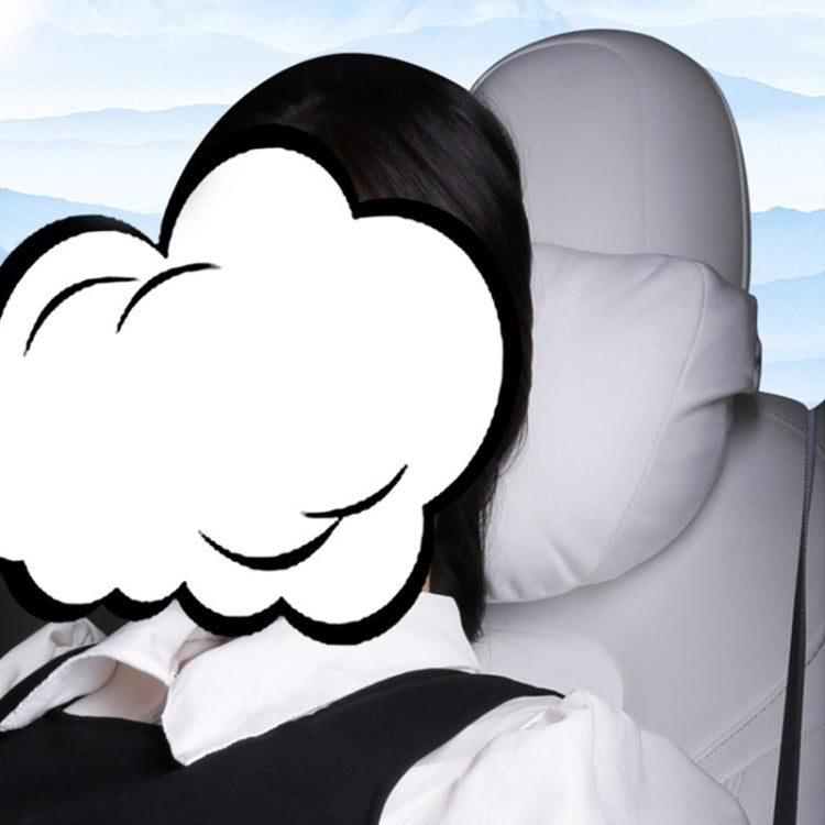 White headrest neck protector cover on car seat with child seated