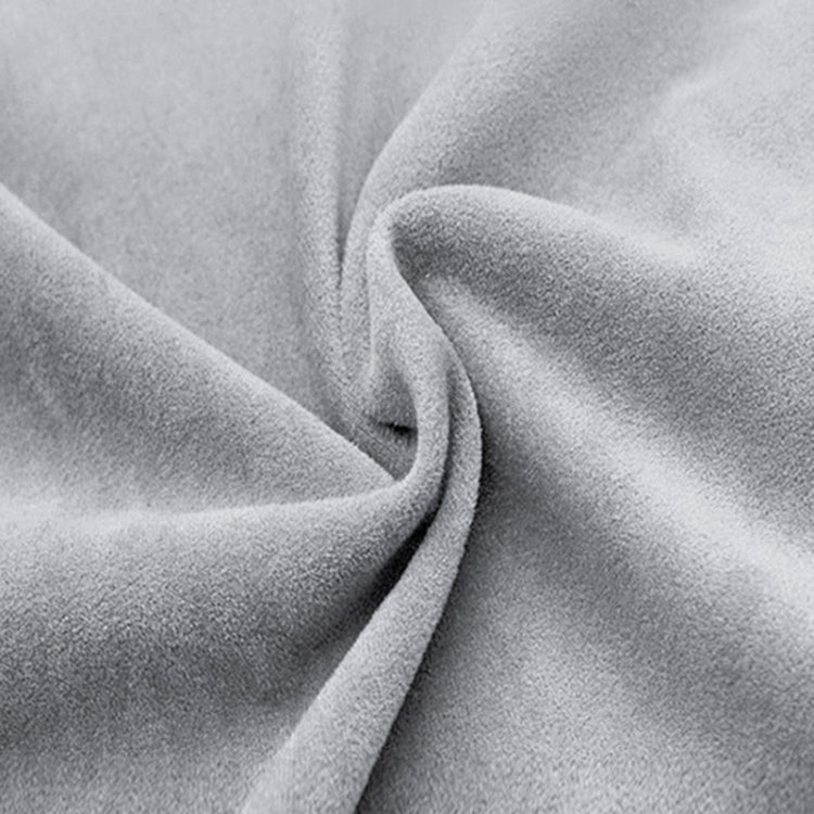 Gray suede mattress fabric close-up with soft, fuzzy texture