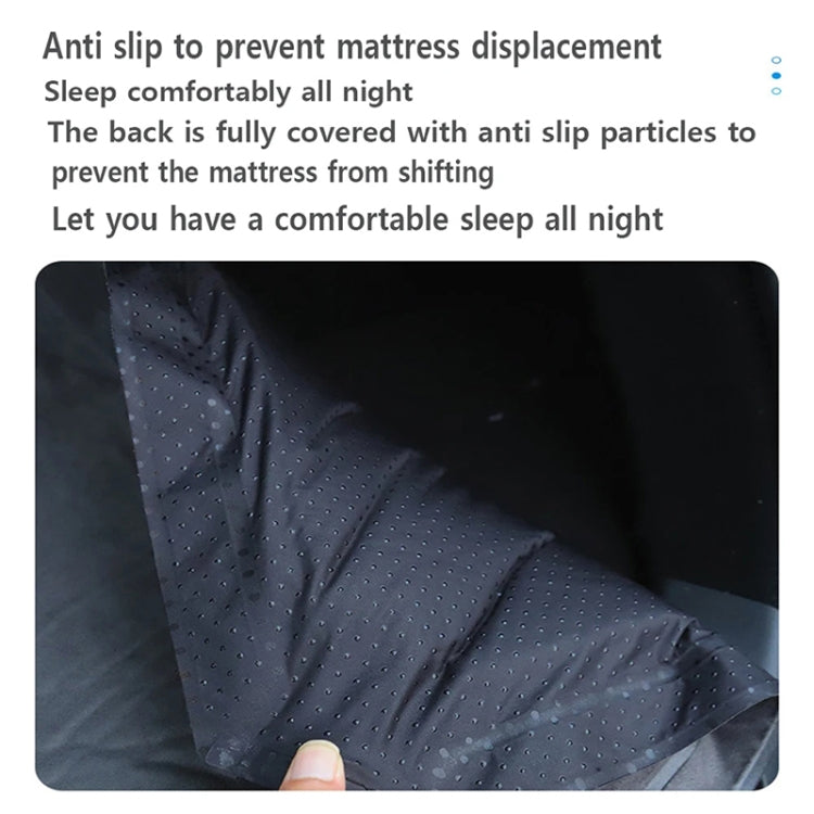 Non-slip dotted underside of dark gray suede car mattress