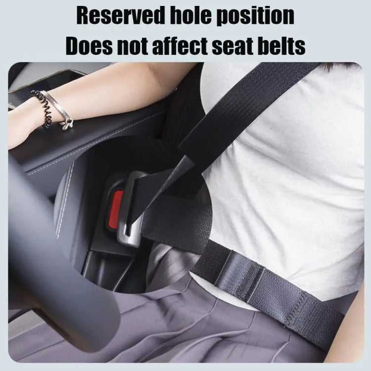 Black seat gap storage box positioned near seat belt, belt area clear