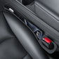 Black car seat gap storage box set along the seat center gap
