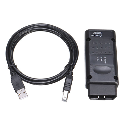 OPCOM V1.95 OBD2 diagnostic scan tool with USB and OBD cables, black housing