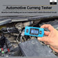Blue automotive current tester held near car engine bay with LCD display