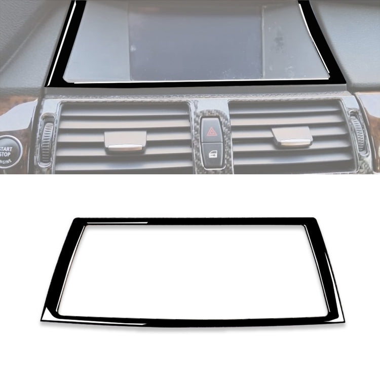 Black navigation frame sticker on car dashboard air vents and center hazard switch