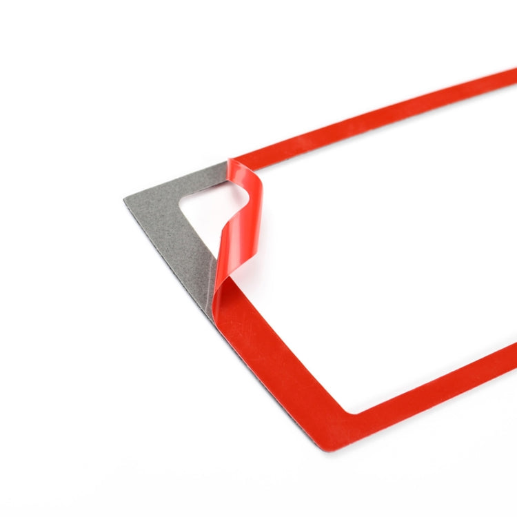 Red navigation frame sticker with gray backing, corner cutout detail