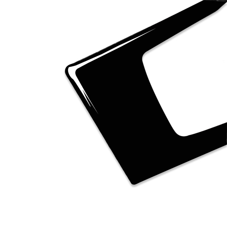 Black trim sticker corner with curved edge and rounded cutout for headlight controls