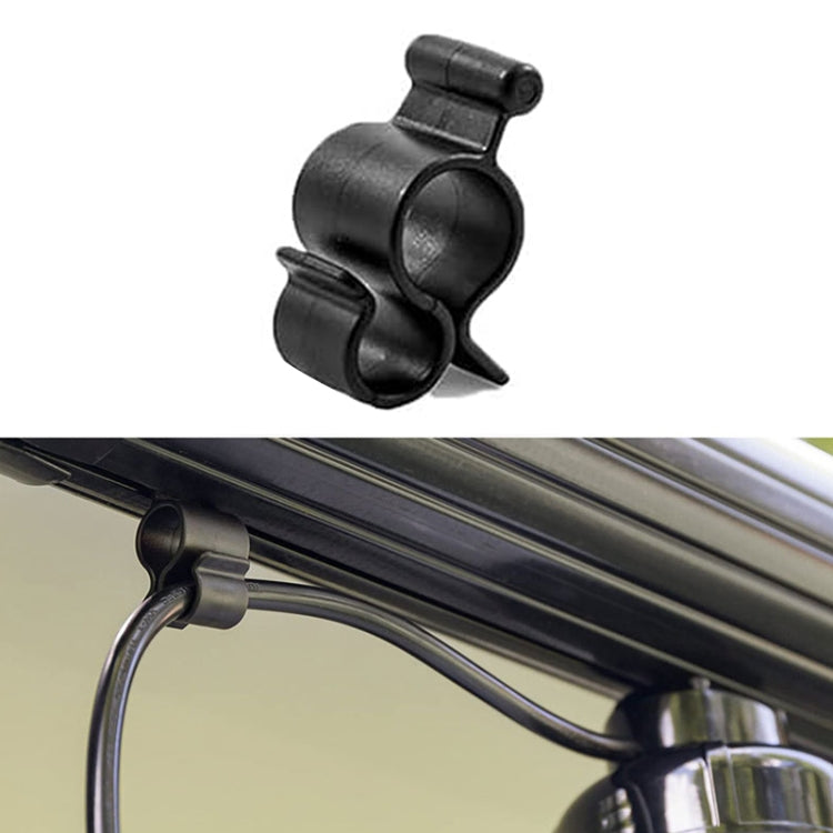 Black awning hook clip mounted on RV canopy rail with S-shaped hanger