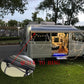Black awning hook clip on RV canopy rail with hanging cords