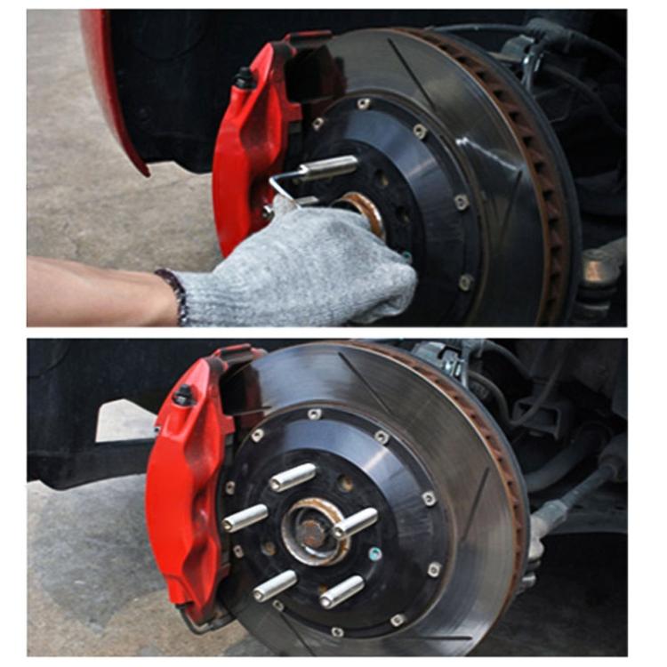 Wheel stud extension adapter bolts shown during installation on car wheel hub