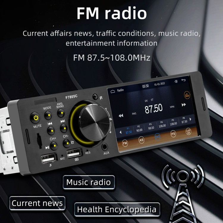 Car MP5 receiver head unit on dashboard with FM screen and large tuning knob