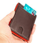 Brown leather card wallet held in hand with teal card and stitched front panel