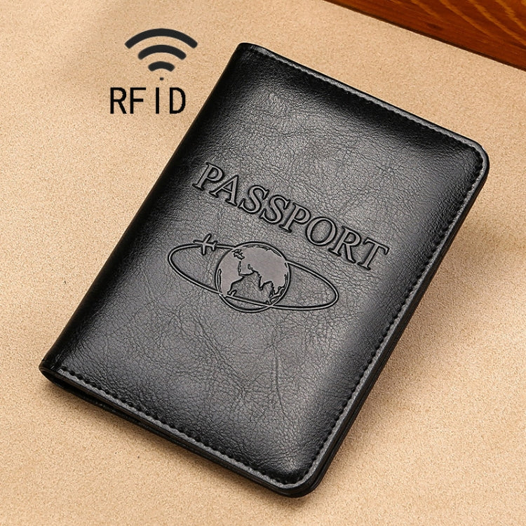 Black RFID leather passport holder with embossed PASSPORT and globe emblem.