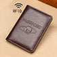 Dark brown RFID leather passport holder with embossed PASSPORT and globe emblem.
