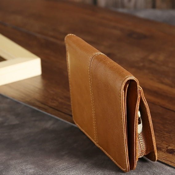 RFID leather wallet, tan-brown leather, side profile with stitched edges
