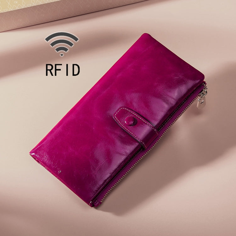 Purple leather RFID wallet with zip closure and front snap strap
