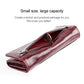 Wine red leather zip-around wallet, rolled-open view of zipper and interior divider