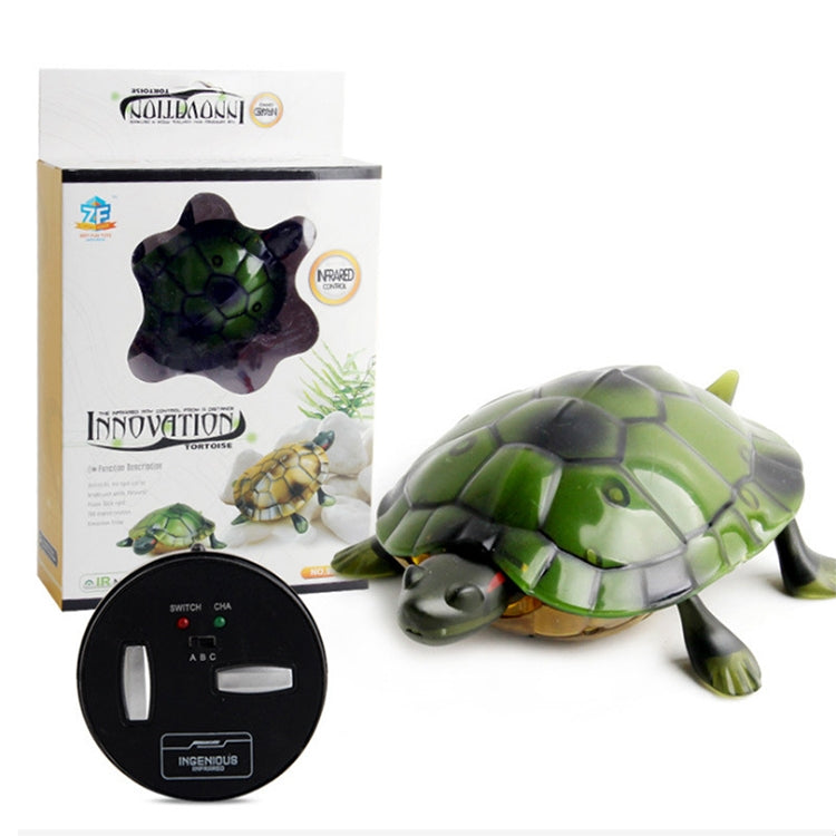 Green and yellow tortoise toy in box set with infrared controller included.