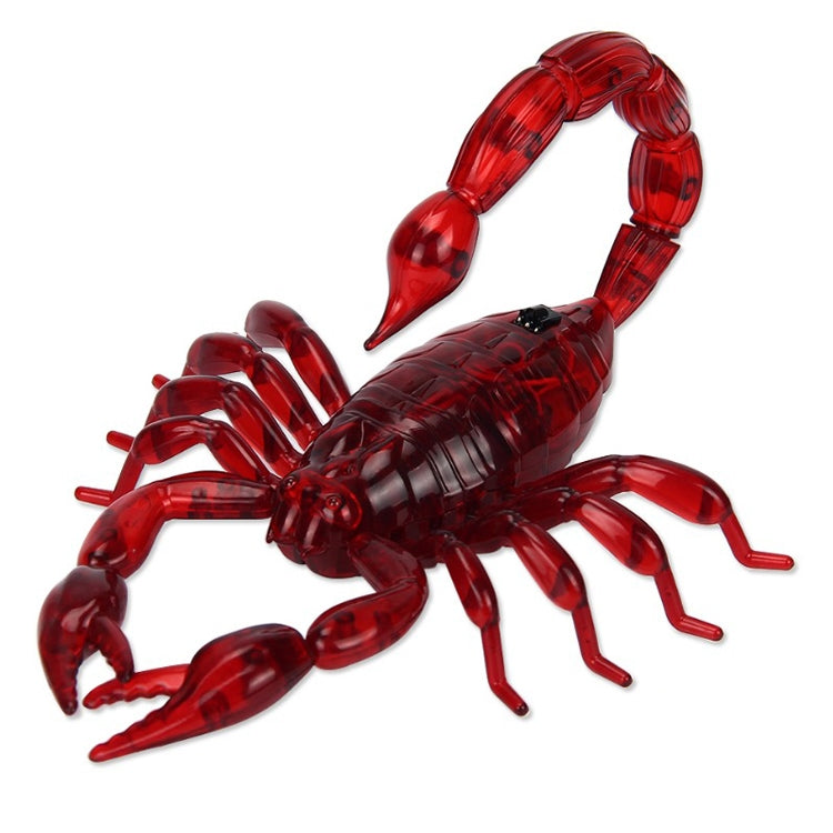 Red translucent scorpion electric toy with raised claws and legs