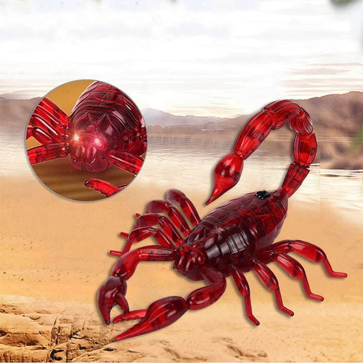 Red translucent scorpion toy with glowing eye lights