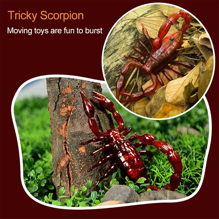 Red scorpion moving toy on outdoor ground