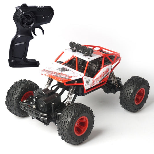 Red RC off-road toy car with 4 rugged wheels and included black remote control