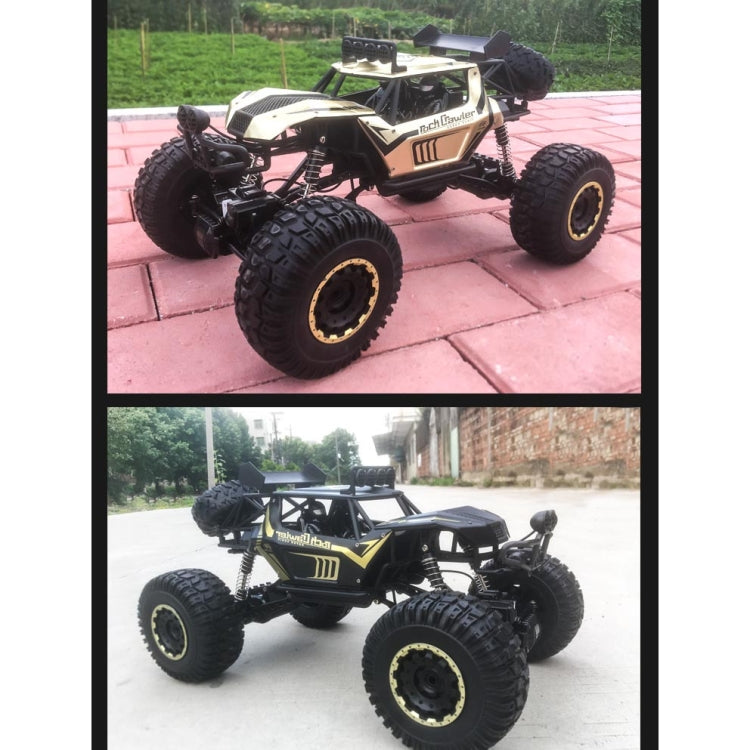 Black and gold RC off-road climbing truck with large tires and front grille
