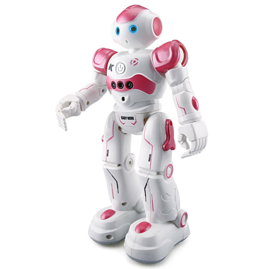 White and pink dancing robot toy with blue eyes, red arms, and raised hands