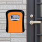 Orange password lock storage box with 4-number keypad, wall-mounted front view.