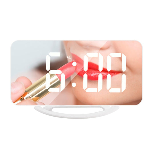 LED mirror clock with glowing 6:00 digits and makeup-mirror reflection, white base