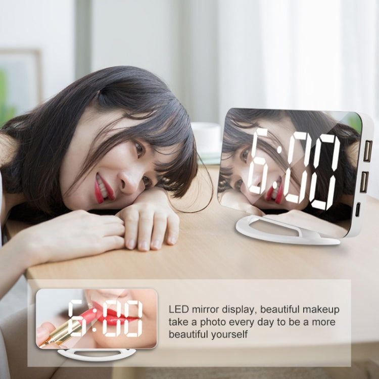 LED mirror clock with glowing digits next to resting person, white frame