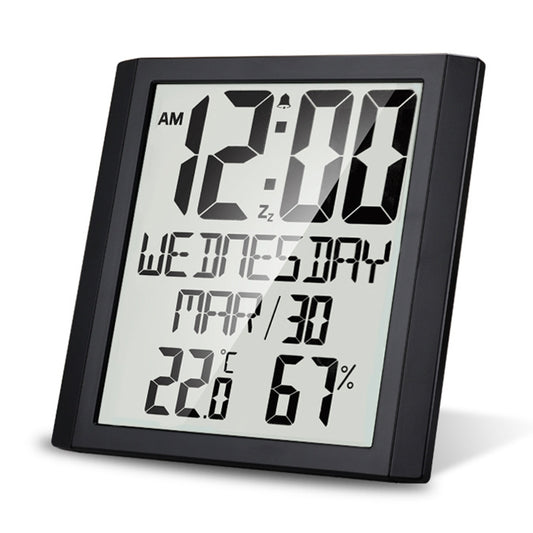 Black digital clock with large LCD, showing time, temperature, and humidity readings