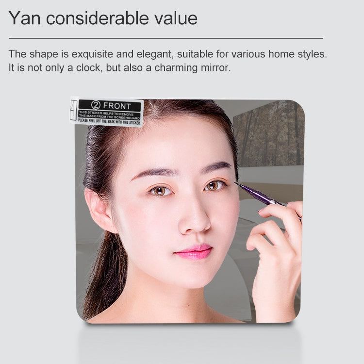 LED mirror alarm clock mirror window reflecting a person, with LED time display