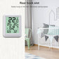 Indoor temperature and humidity meter with rear hook slot, mounted on wall