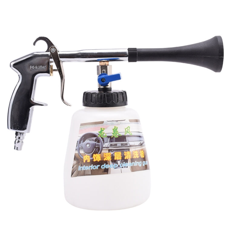 High pressure spray gun with trigger handle and white cleaning spray bottle