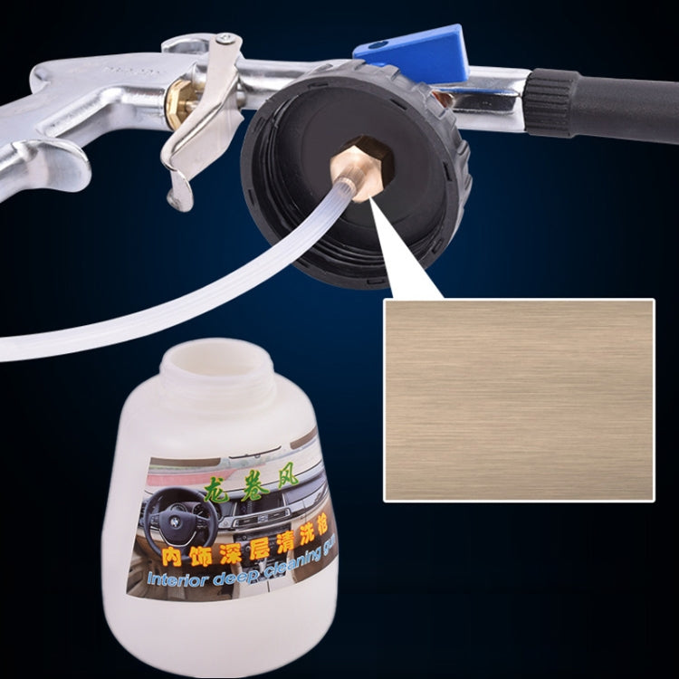 Car cleaning spray gun with connected hose, white bottle, and blue switch