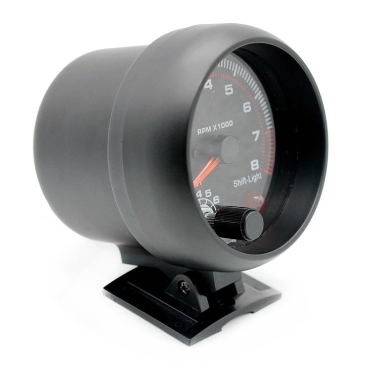 3.75-inch 12V car tachometer from side with grey housing and dial window
